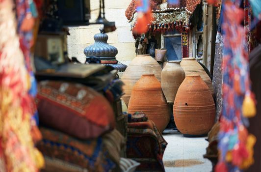 Ceramics and carpets at antique store