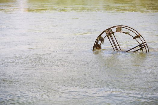 Vintage Water wheel in the river