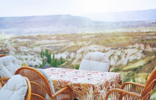 Table and chairs at open air cafe