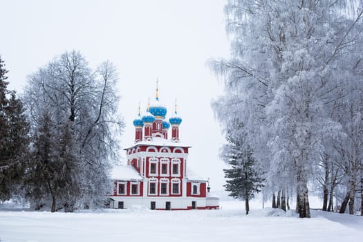 White church in winter in Uglich
