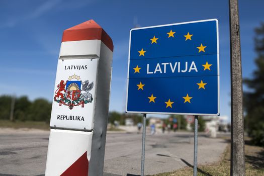General Schengen country border sign of Latvia located on the border between Latvia and Lithuania.
