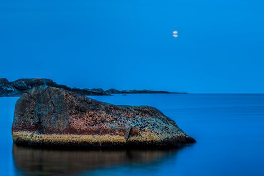 Moonlight over the rolling stones of the Norwegian coast, Moelen