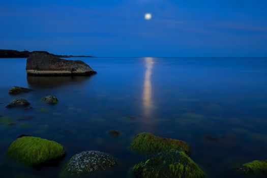 Moonlight over the rolling stones of the Norwegian coast, Moelen