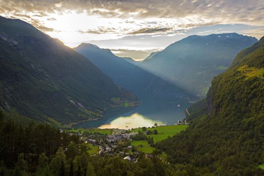 The Geiranger fjord in Norway, surrounded by high mountains