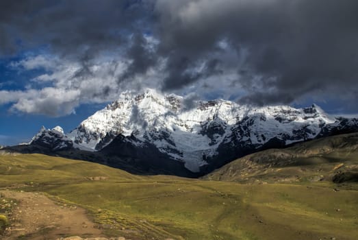 Sunlit peaks of the Ausangate mountain in Peru                   