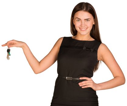 Pretty young lady holding keys isolated on white background