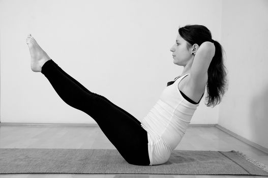 Young girl doing yoga pose