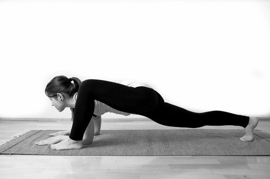 Young girl doing yoga pose