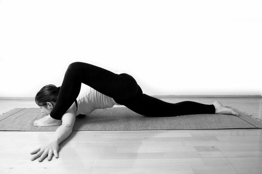 Young girl doing yoga pose