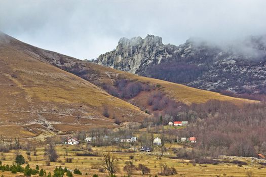 Velebit mountain village in fog, Daske ostarije, Croatia