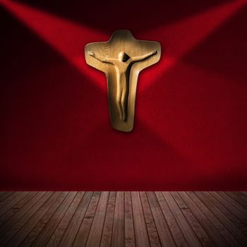 Light brown wooden crucifix hanging on red velvet wall and two top lights - Christian religion background