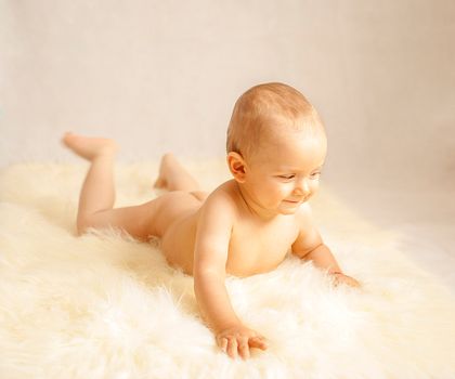 portrait of a happy caucasian adorable baby boy