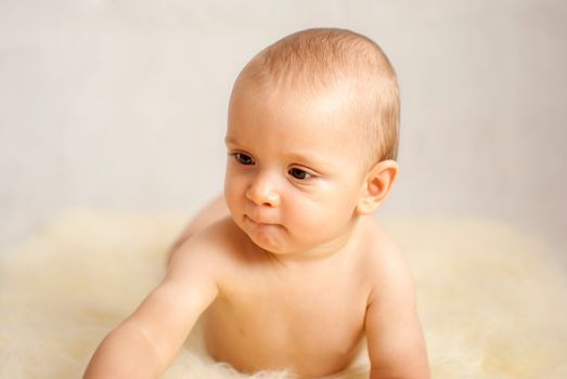 portrait of a happy caucasian adorable baby boy