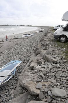 wind surfers vans parked on the wild atlantic way in county Kerry Ireland