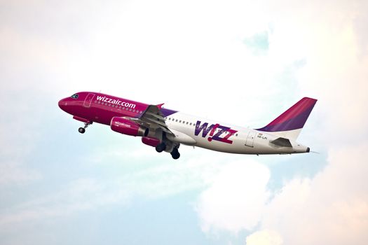 BUDAPEST, HUNGARY - APRIL 11: Wizzair flight departing from Budapes (LHBP). It's a very popular low-cost airline in Middle-Eastern Europe.