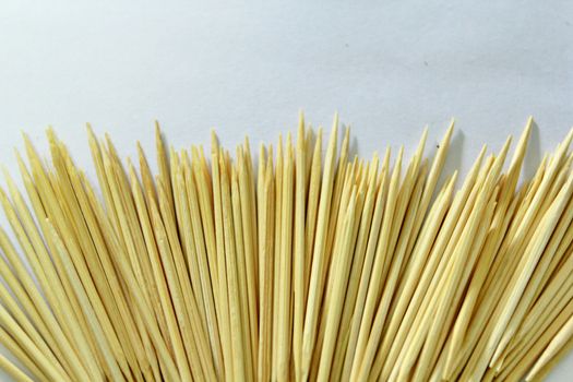 Many toothpicks are on the ground.They cannot be use.