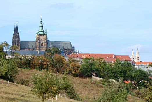 Photo is showing various views onto the Prague castle and its gardens in the spring time.