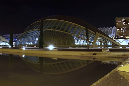 Photo shows Valencia city at night and its various surroundings.