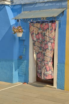 Blue house in the island of Burano, Venice, Italy
