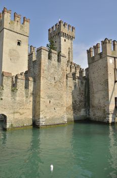 The Scaliger Castle at Sirmione on lake Grada, Italy. The Castle was built in the 13th century.  This is a rare example of medieval port fortification, which was used by the Scaliger fleet.