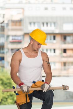 Construction Worker Relaxing The Fresh Air During Work