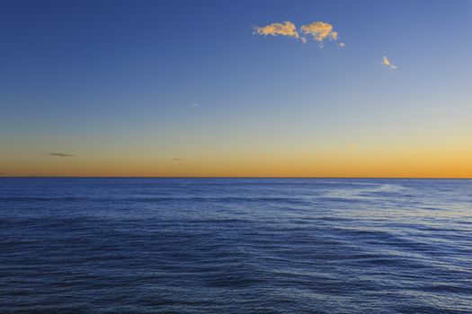 Picture of a dawn on the open sea. 