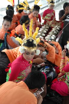 Bandung, Indonesia - March 9, 2008: Dancer member and musical crew gather together and make preparation before get performing on stage at Tegalega Park Bandung, West Java-Indonesia.