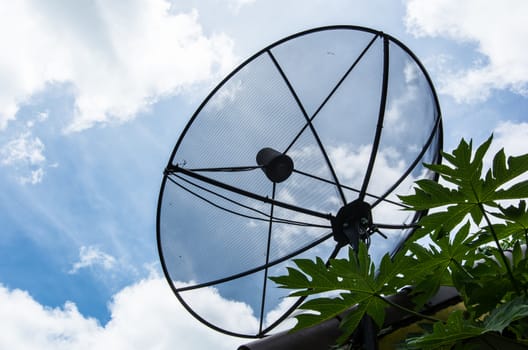 Satellite dish on the top roof with sky sunset communication technology network