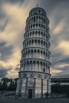 Pisa leaning tower at sunrise, Italy. Special photographic processing.
