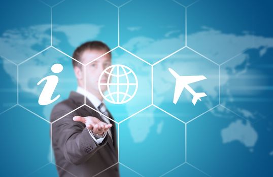 Business man hold icons. Technology concept. World map as backdrop