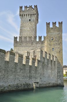 The Scaliger Castle at Sirmione on lake Grada, Italy. The Castle was built in the 13th century.  This is a rare example of medieval port fortification, which was used by the Scaliger fleet.