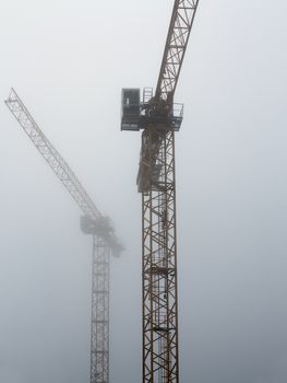 Image of the derricks in the fog