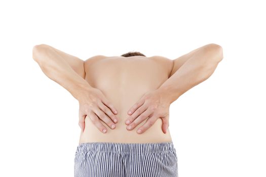 Back pain. Caucasian man touching lower back with both hands isolated on white background. 