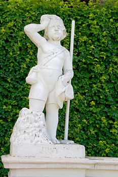 Photo shows general view of statue in garden of Belvedere Palace.