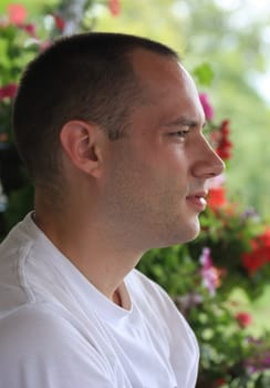 Portrait of young man in nature