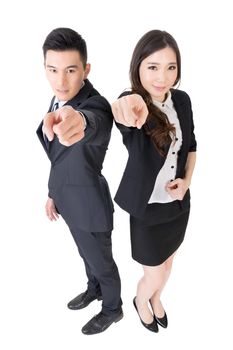 Smiling Asian business man and woman point at you, full length portrait on white background.