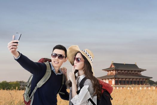 Asian couple travel and selfie in Nara Imperial Palace, Nara, Japan.