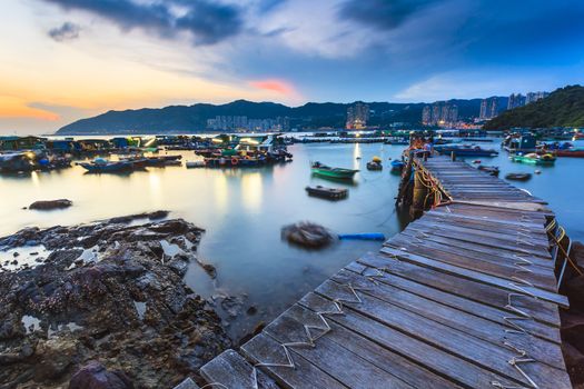 Sunset at fishing village wooden bridge