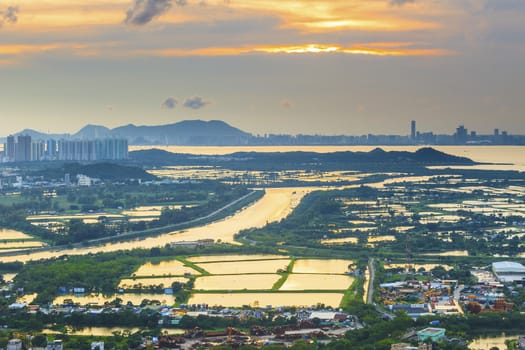 Sunset farmland and pond in Hong Kong