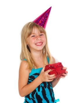Girl 5 years with a birthday gift and cap