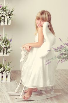 a Baby girl in an angel dress