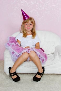 Pretty joyful kid girl on Holiday party