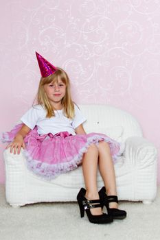 Pretty joyful kid girl on Holiday party