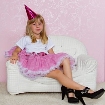 Pretty joyful kid girl on Holiday party