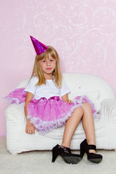 Pretty joyful kid girl on Holiday party