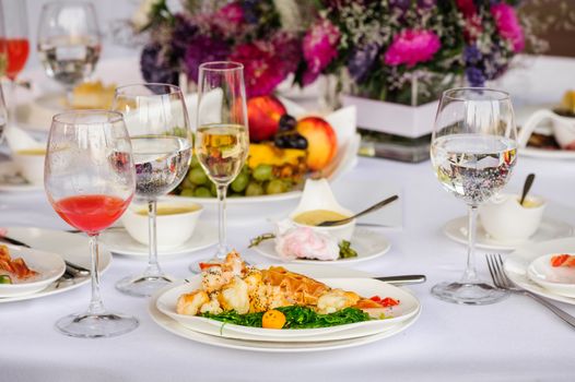 Prepared lobster and sea weed served on plates