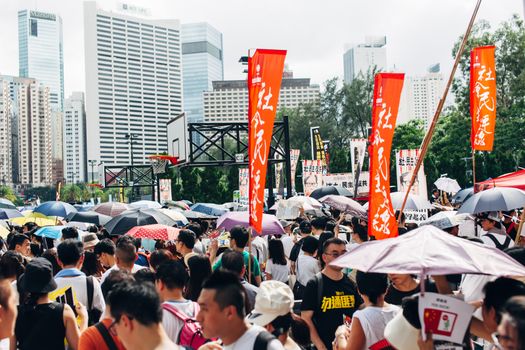 HONG KONG - JULY 1: Hong Kong people seek greater democracy as frustration grows over the influence of Beijing on July 1, 2014 in Hong Kong. Organizers of protest claimed a turnout of 510,000 people.