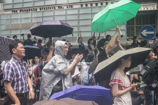 HONG KONG - JUNE 20: Protesters gathered outside the government headquarters on June 20, 2014 in Hong Kong. The Finance Committee is vetting a funding request about northeast New Territories.