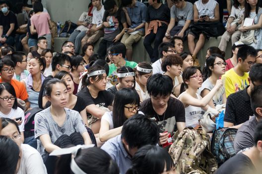 HONG KONG - JUNE 20: Protesters gathered outside the government headquarters on June 20, 2014 in Hong Kong. The Finance Committee meeting in the Legislative Council that is vetting an initial HK$340 million funding request to build two new towns in northeast New Territories in Hong Kong.