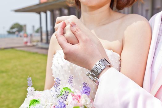 Couple holding hands